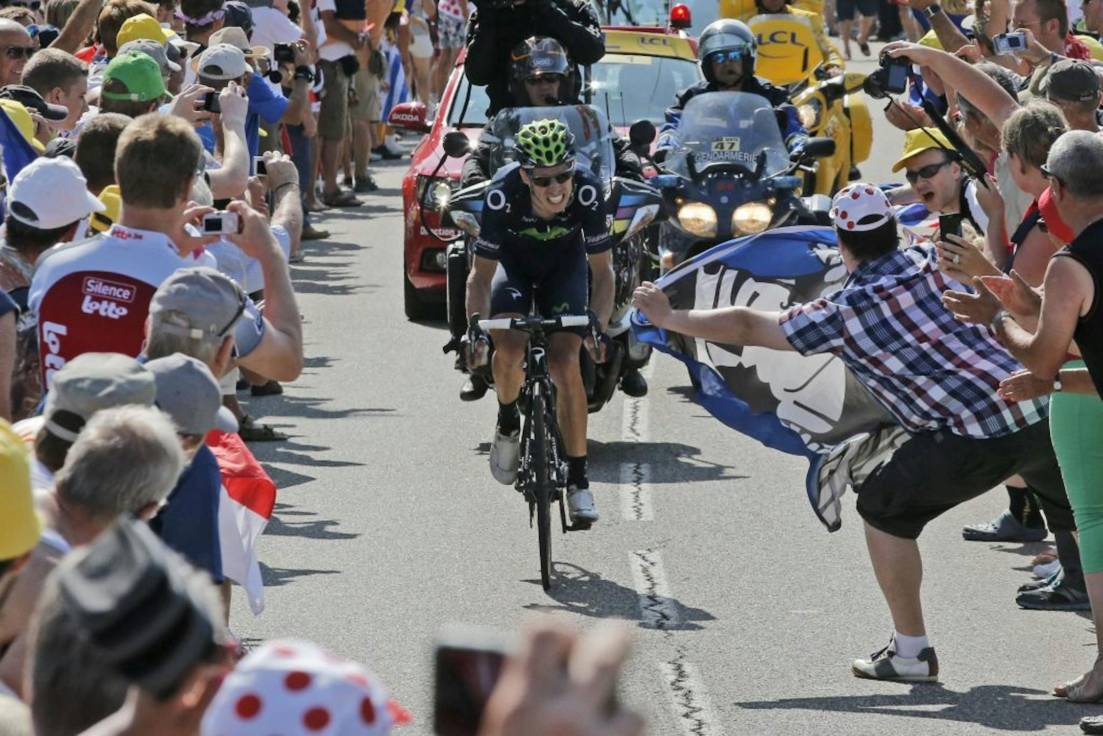 Stage winner Rui Alberto Costa of Portugal climbs Manse pass during the sixteenth stage of the Tour de France cycling race over 168 kilometers (105 miles) with start in in Vaison-la-Romaine and finish in Gap, France, Tuesday July 16, 2013.