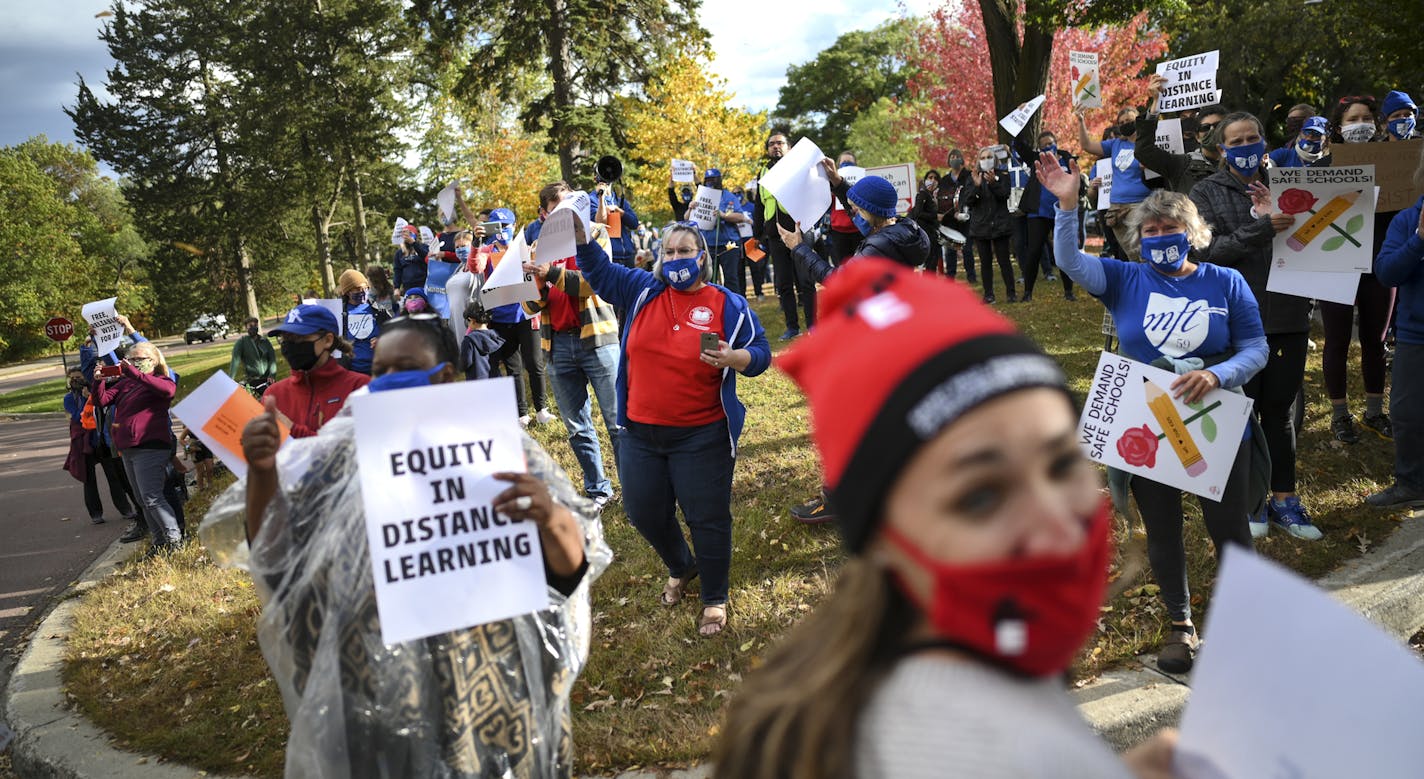 Teachers and supporters called for safer working environments for teachers and students at Wednesday afternoon's rally. ] aaron.lavinsky@startribune.com Teachers from Minneapolis and St. Paul schools held a rally Wednesday afternoon, calling for the districts to address a variety of issues to make sure schools are safe and equitable during the pandemic. They want to negotiate issues of safety and academic quality, address staffing ratios and hazard pay for education support professionals, make s