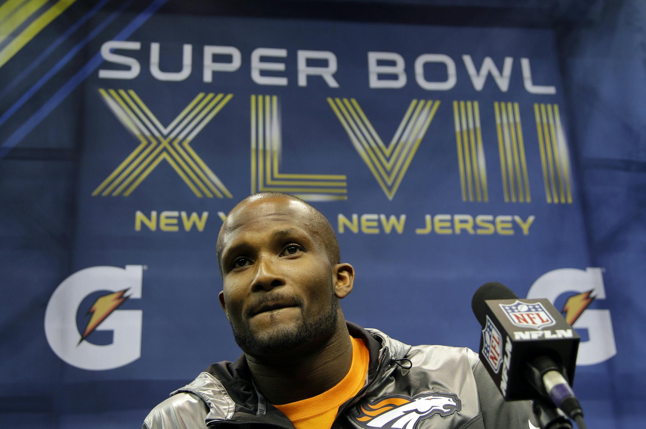 Denver Broncos' Champ Bailey answers a question during media day for the NFL Super Bowl XLVIII football game Tuesday, Jan. 28, 2014, in Newark, N.J. (AP Photo/Matt Slocum)