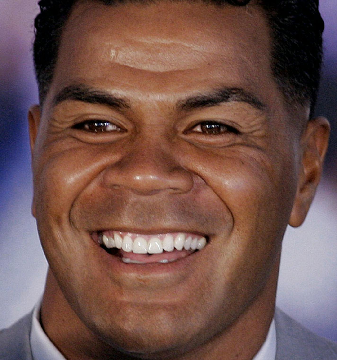 FILE - From left are Orlando Pace in a 2006 file photo, Junior Seau in a 2006 file photo and and Kurt Warner in a 2010 file photo. All three, in their first year of eligibility, are among the finalists for the Pro Football Hall of Fame's class of 2015, that will be announced Saturday, Jan. 31, 2015. (AP Photo/File)