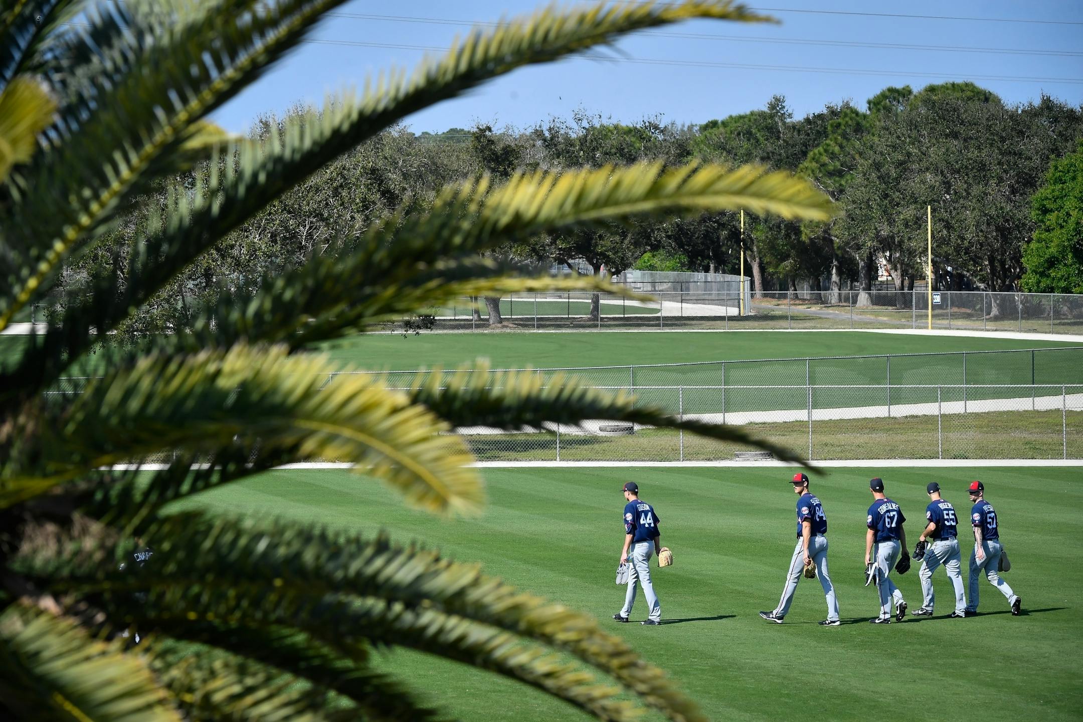 Minnesota Twins pitchers made their way through the backfields after their morning workout Wednesday.