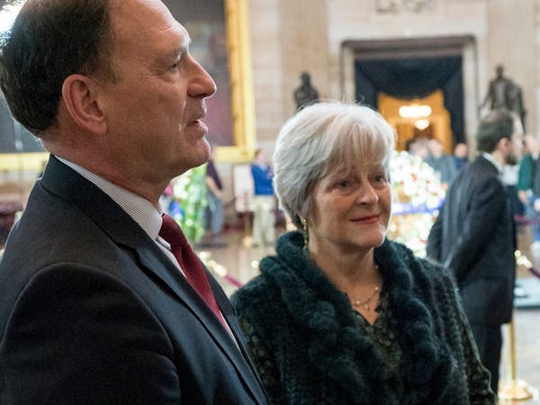 U.S. Supreme Court Justice Samuel Alito and his wife, Martha-Ann, at the U.S. Capitol Rotunda in 2018. News of a “Stop the Steal” symbol that flew