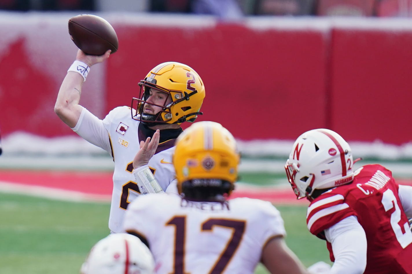 Minnesota quarterback Tanner Morgan (2) throws as pass during the first half of an NCAA college football game against Nebraska in Lincoln, Neb., Saturday, Dec. 12, 2020. (AP Photo/Nati Harnik)