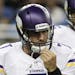 Minnesota Vikings quarterback Christian Ponder heads for the bench during the first quarter of an NFL football game against the Detroit Lions on Sept.