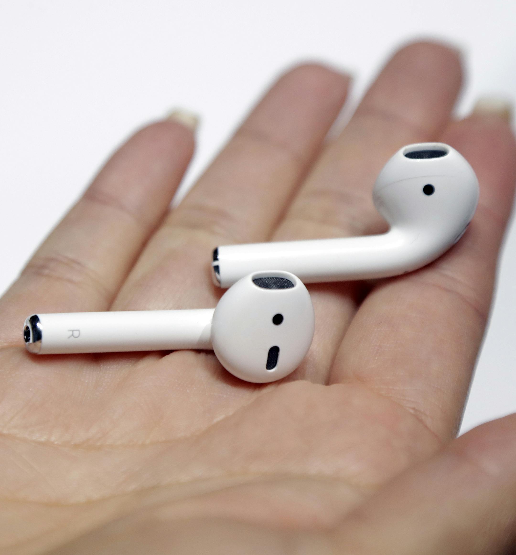 The new Apple AirPods are shown during an event to announce new Apple products on Wednesday, Sept. 7, 2016, in San Francisco. (AP Photo/Marcio Jose Sanchez)