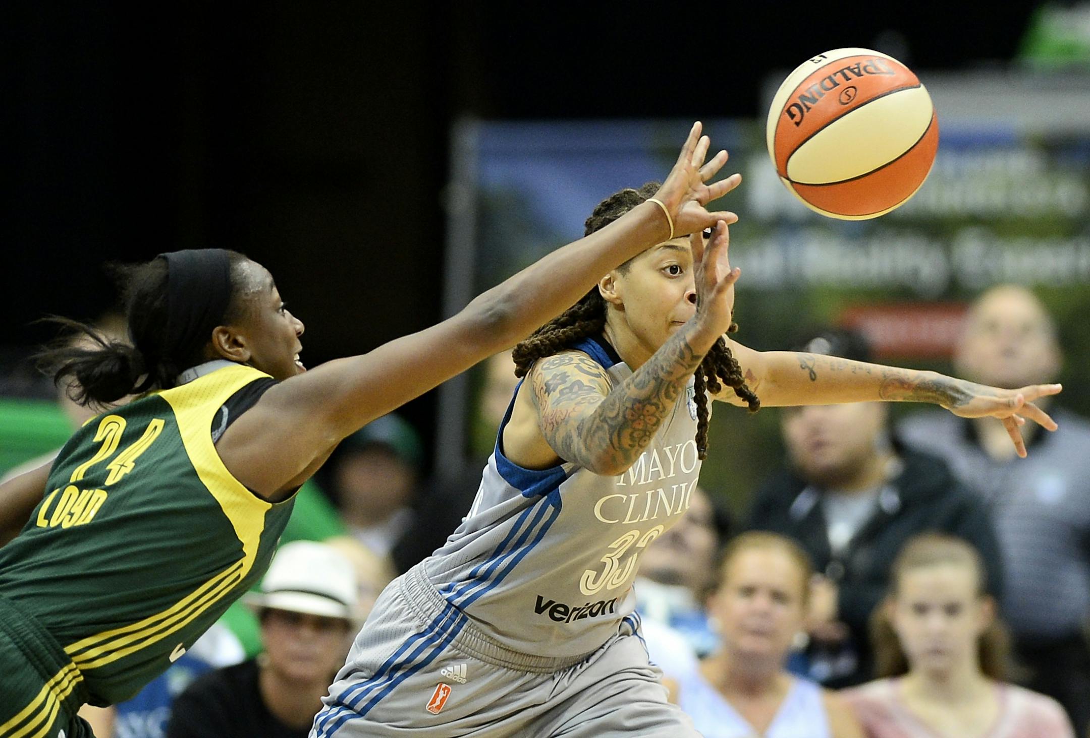 Minnesota Lynx guard Seimone Augustus (33) knocked the ball loose from Seattle Storm guard Jewell Loyd (24) in the third quarter for a steal.