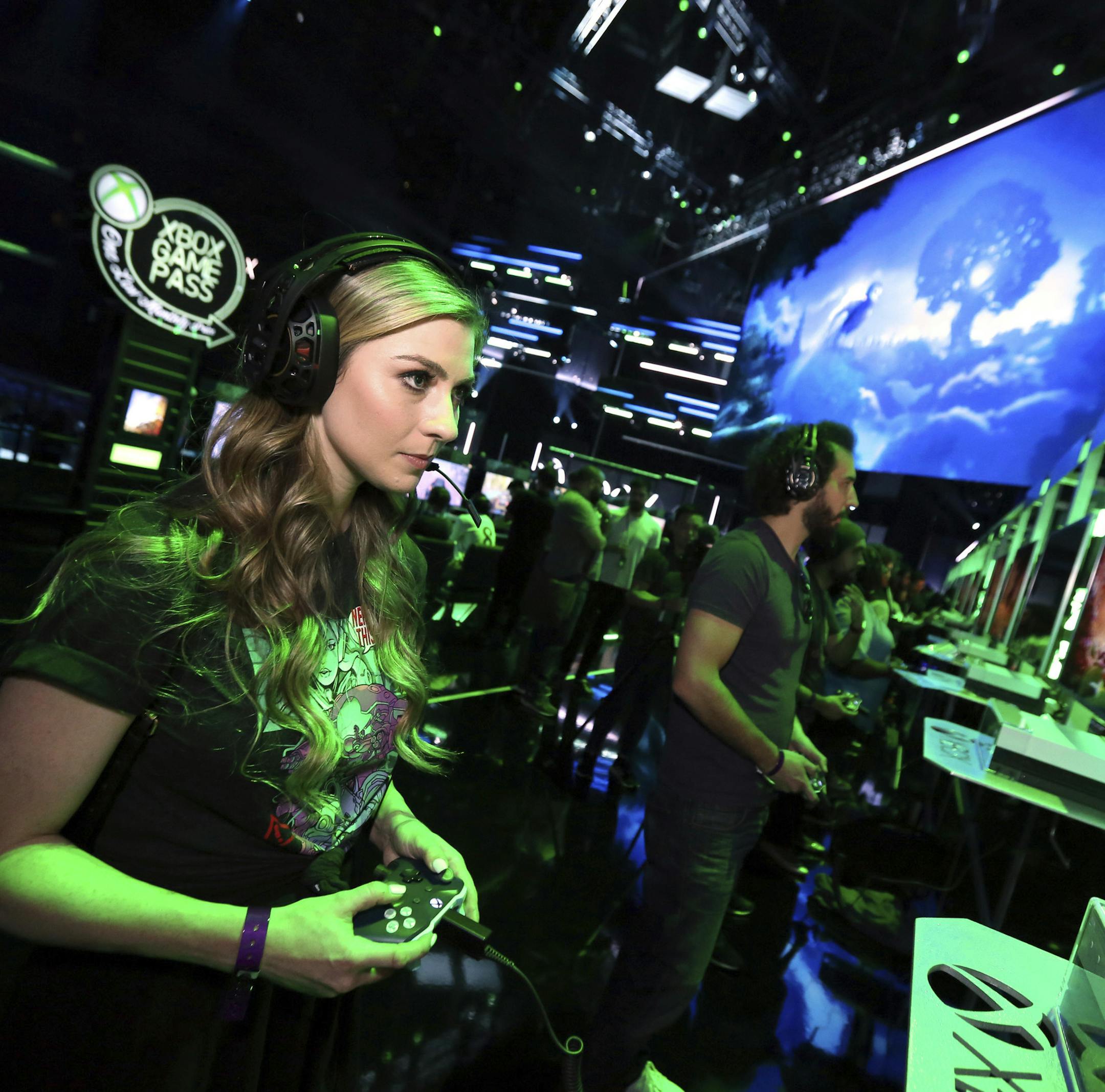 IMAGE DISTRIBUTED FOR MICROSOFT - A gamer plays "Ori and the Will of the Wisps" at Xbox E3 2018 Showcase in Los Angeles on Sunday, June 10, 2018. (Photo by Casey Rodgers/Invision for Microsoft/AP Images)