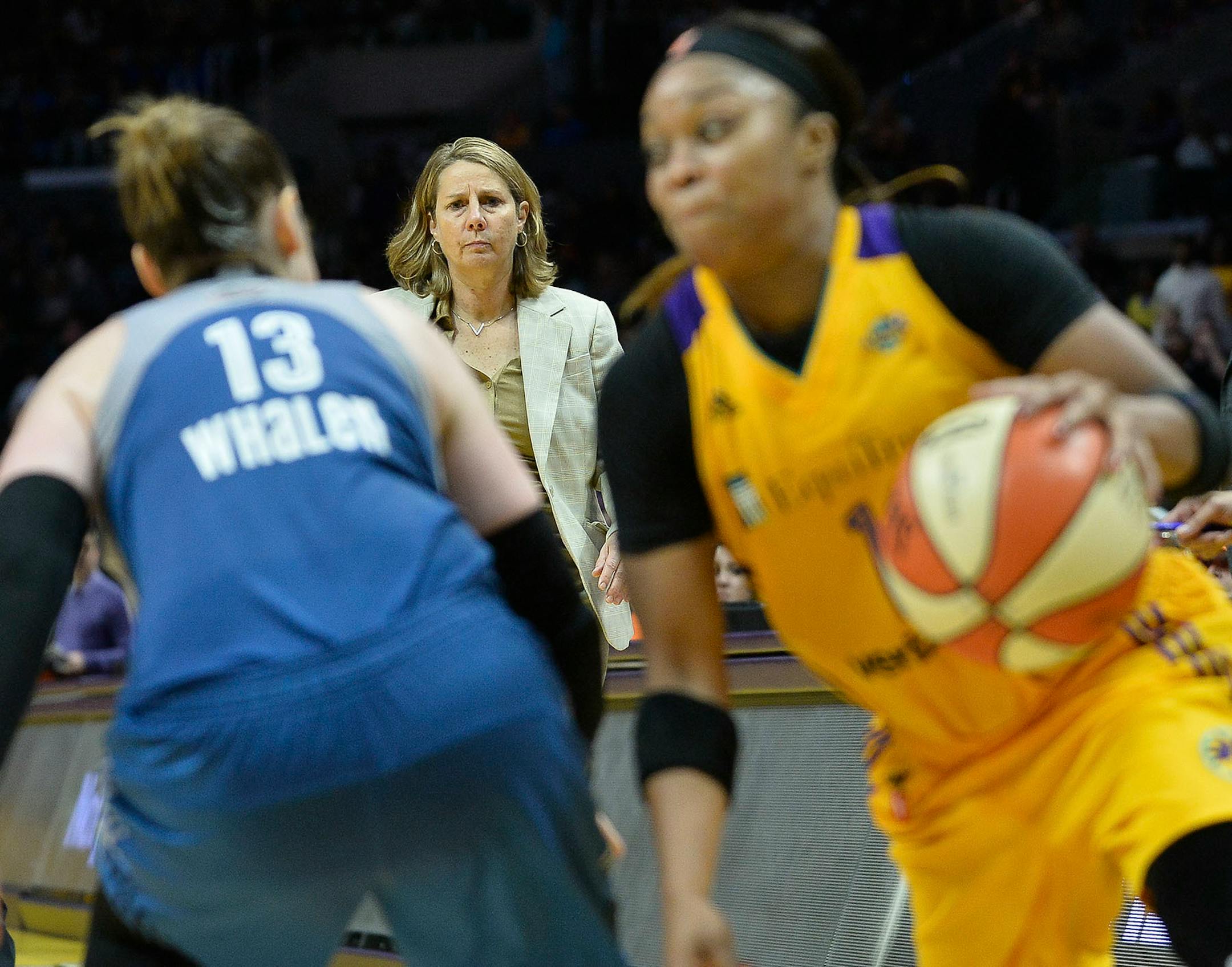 Minnesota Lynx head coach Cheryl Reeve watched as guard Lindsay Whalen (13) defended Los Angeles Sparks guard Odyssey Sims (1) in the fourth quarter.