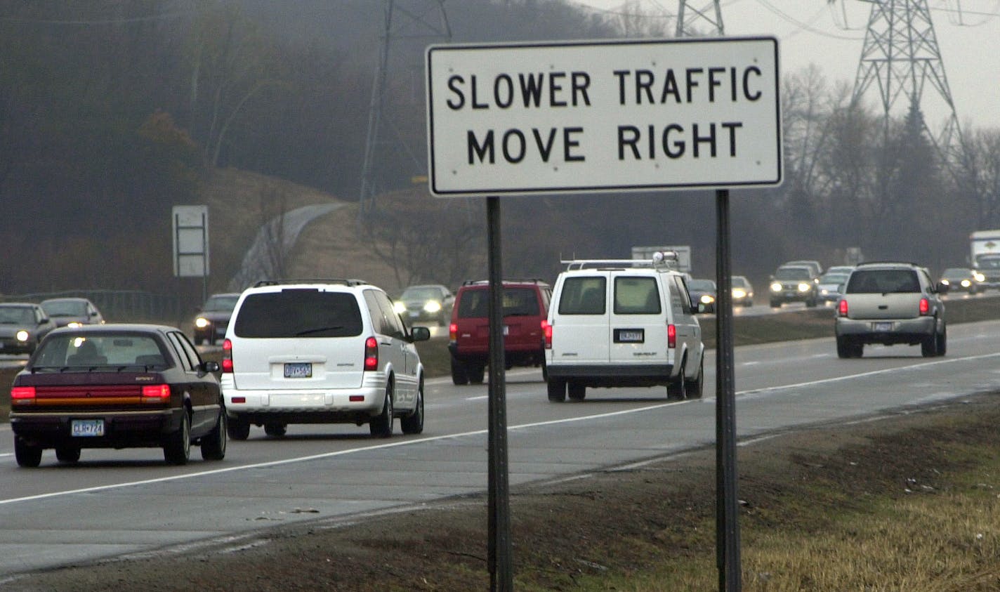 GENERAL INFORMATION: Minnetonka,Mn. 4/10/2002 WILL GO FROM HOME -- Story is about the slow traffic move right signs that went up in the summer of 2000. Have they made a difference? Most people have not seen the signs because there are so few of them. Please get a shot of one of the signs south of I-394 and north of Minnetonka Blvd. on I-494.
IN THIS PHOTO: South bound on 494 Slower Traffic Move Right sign