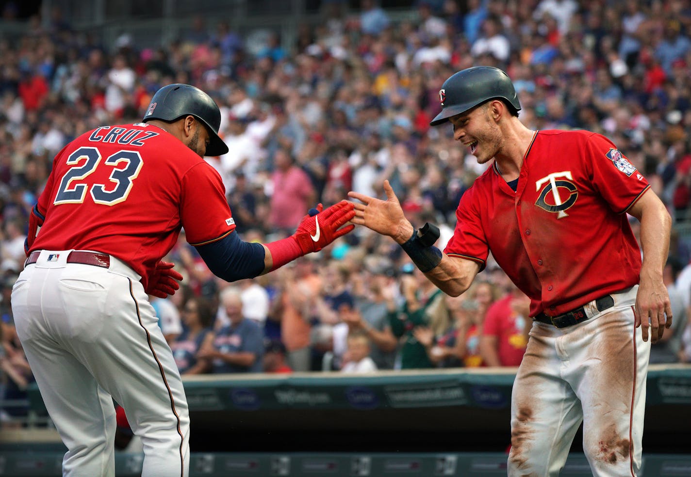 Twins Nelson Cruz celebrates with teammate Max Kepler at home plate after Curz his a two-run-homer in the 1st inning. Twins lead 2-1 after 1 inning. ] Minnesota Twins -vs- Kansas City Royals
brian.peterson@startribune.com
Minneapolis, MN
Friday, August 2, 2019