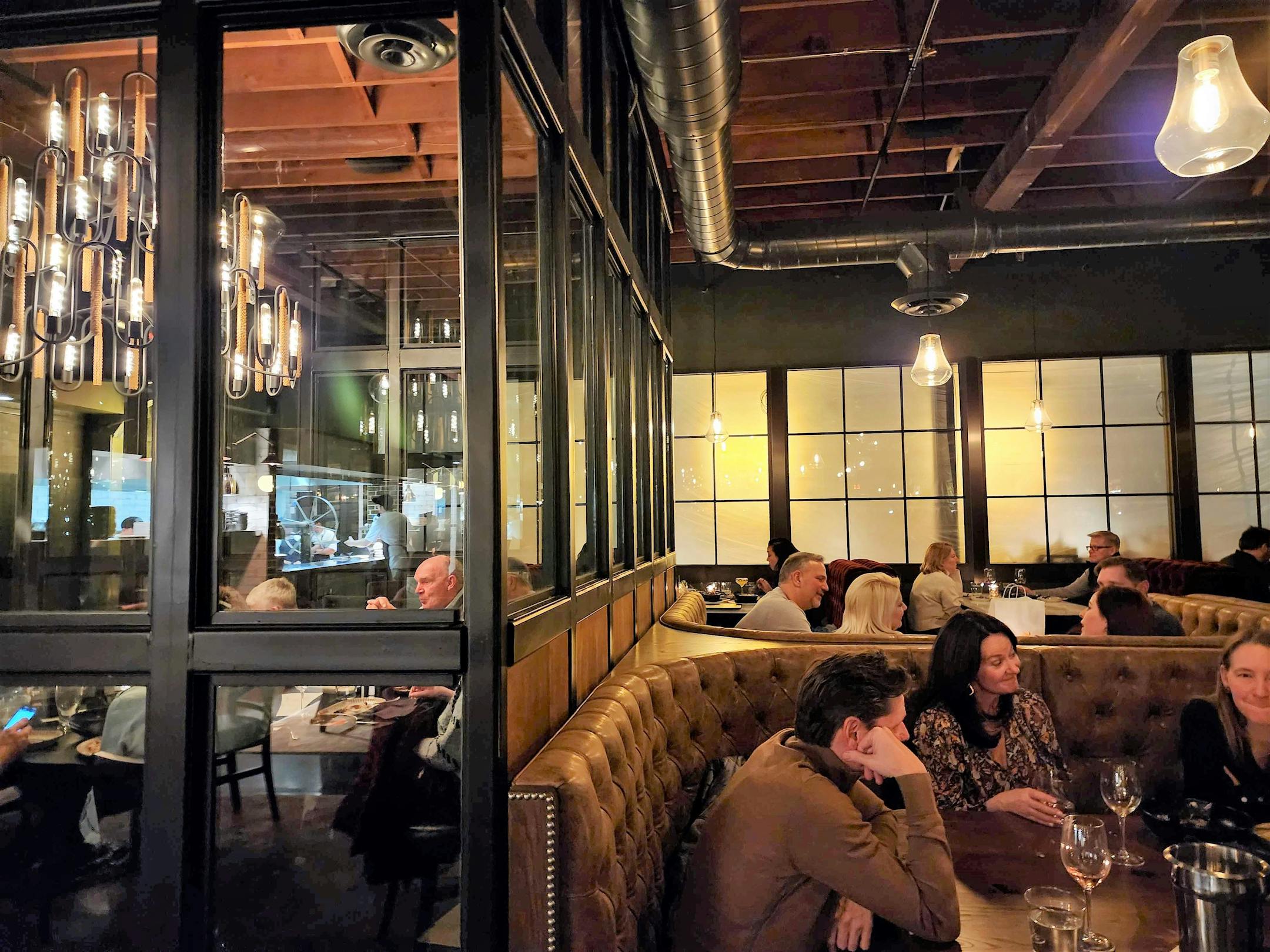 Like the original Butcher &amp; the Boar, the new space features windowed walls around private dining spaces and cushy booths for large parties.