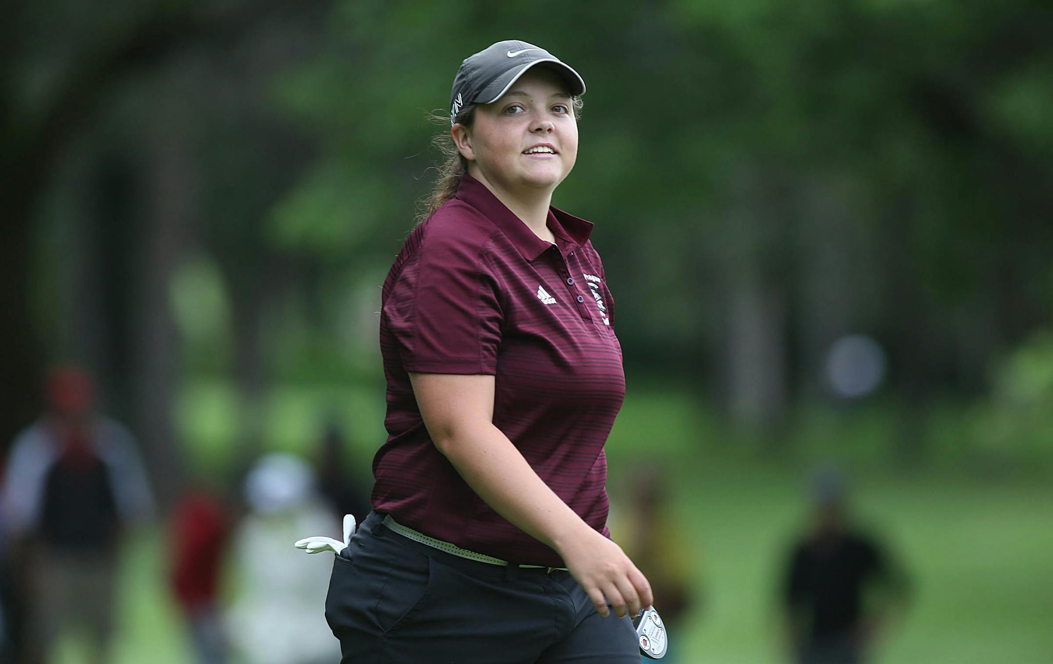 Taylor Ledwein walked to the 9th green during Wednesday's final round. (Jim Gehrz/Star Tribune)