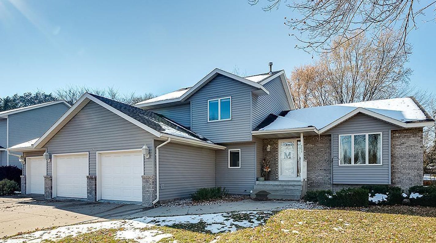 Hastings Built in 1993, this four-bedroom, three-bath house has 3,001 square feet and features three bedrooms on the upper level, fireplace, vaulted ceilings, eat-in kitchen, full partially-finished walkout basement, patio, deck and heated, insultated three-car attached garage. Listed by Mary Murphy, 651-353-9838, and Kari Skorkamp, 651-470-0709, Edina Realty.