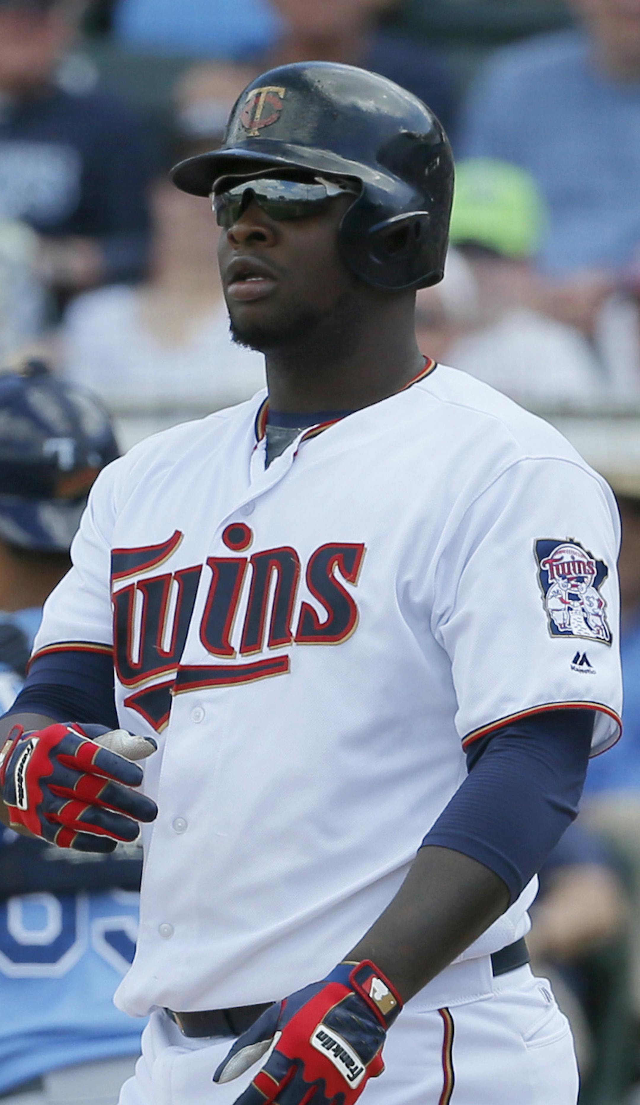 Minnesota Twins' Miguel Sano tosses his bat after striking out against the Tampa Bay Rays in a spring training baseball game, Wednesday, March 23, 2016, in Fort Myers, Fla. (AP Photo/Tony Gutierrez) ORG XMIT: OTKTG232