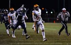 Jake Ratzlaff of Rosemount, shown in an Oct. 30 game against Champlin Park, has announced his verbal commitment to play football at Wisconsin. He had 