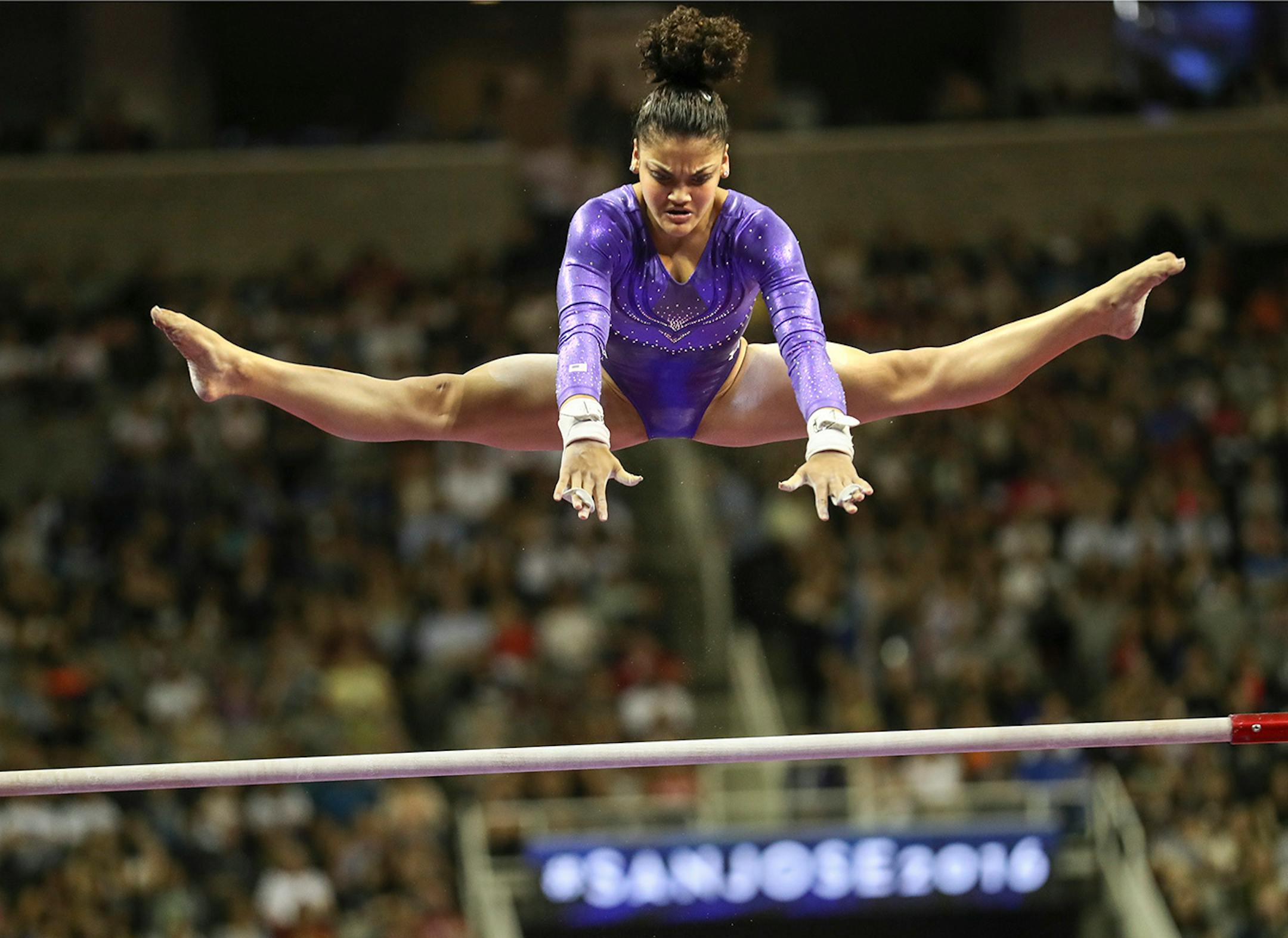 Day 1 - Lauren Hernandez performs on the uneven bars during the first night of competition.