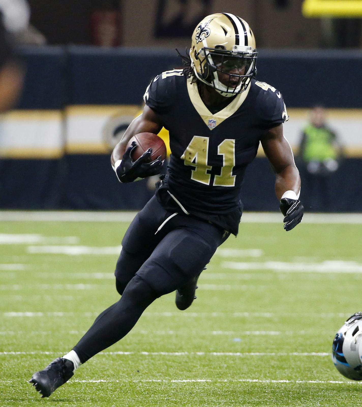 New Orleans Saints running back Alvin Kamara (41) carries in the first half of an NFL football game against the Carolina Panthers in New Orleans, Sunday, Jan. 7, 2018. (AP Photo/Butch Dill) ORG XMIT: LAGH