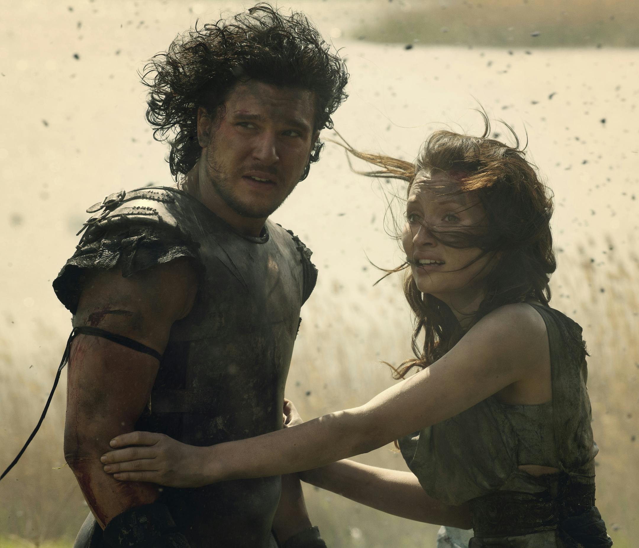 Milo (Kit Harington) and Cassia (Emily Browning) in TriStar Pictures' POMPEII. ORG XMIT: Emily Browning (Finalized);Kit H