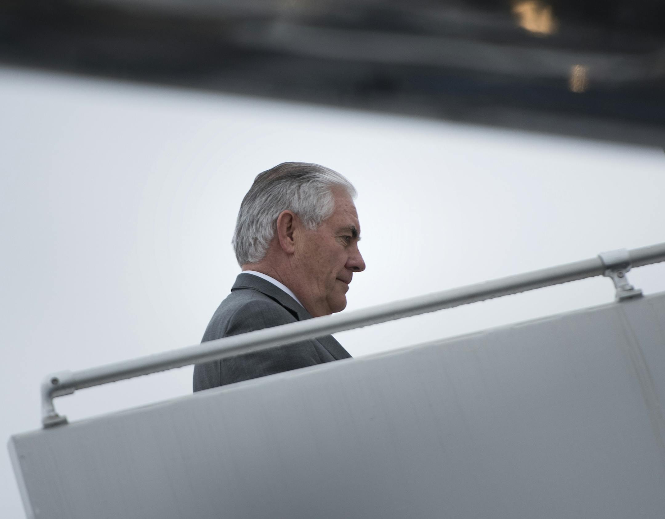 US Secretary of State Rex Tillerson boards his plane at Cologne Bonn Airport, western Germany, as he leaves after a meeting of Foreign Ministers of the G20 leading and developing economies on Friday Feb. 17, 2017. (Brendan Smialowski/pool via AP)