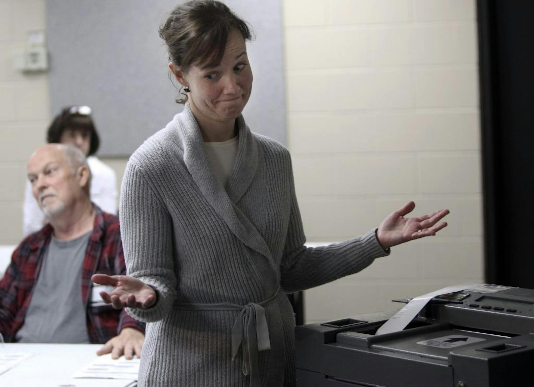 Hennepin County Elections Manager Rachel Smith had good luck Wednesday in feeding a previously rejected ballot through an optical ballot scanner.