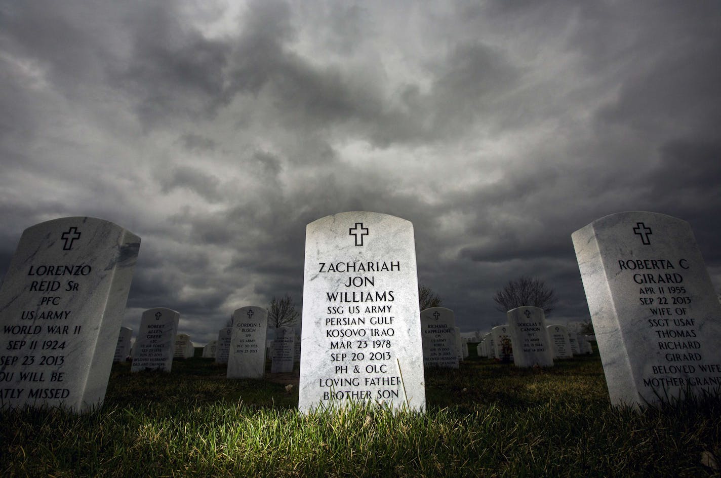 Zach Williams' gravestone sits in the sea of white granite at Fort Snelling National Cemetery. After his pain meds were cut off, he died of an overdose in his Apple Valley home after taking a cocktail of pills obtained from a variety of doctors.