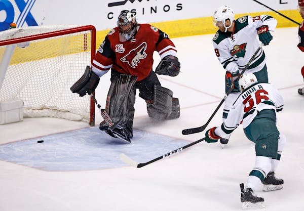 The Wild's Erik Haula, right, scored a goal on a turnover by the Coyotes' Mike Smith on Saturday.