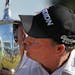 Joe Durant planted a kiss on the trophy after his playoff victory in 3M Championshionship at TPC Twin Cities on Sunday.