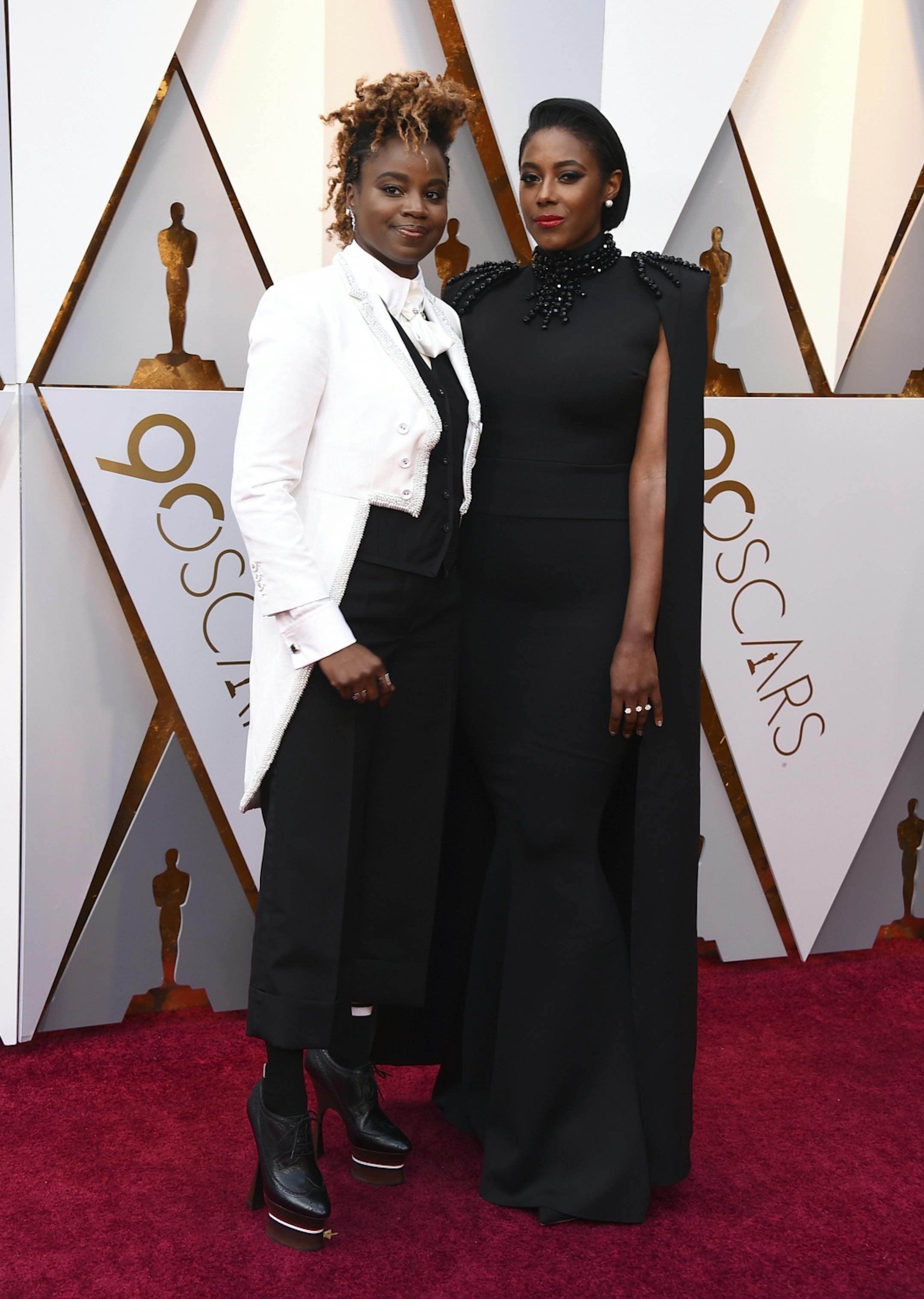 Dee Rees, left, and Sarah M. Broom arrive at the Oscars on Sunday, March 4, 2018, at the Dolby Theatre in Los Angeles.