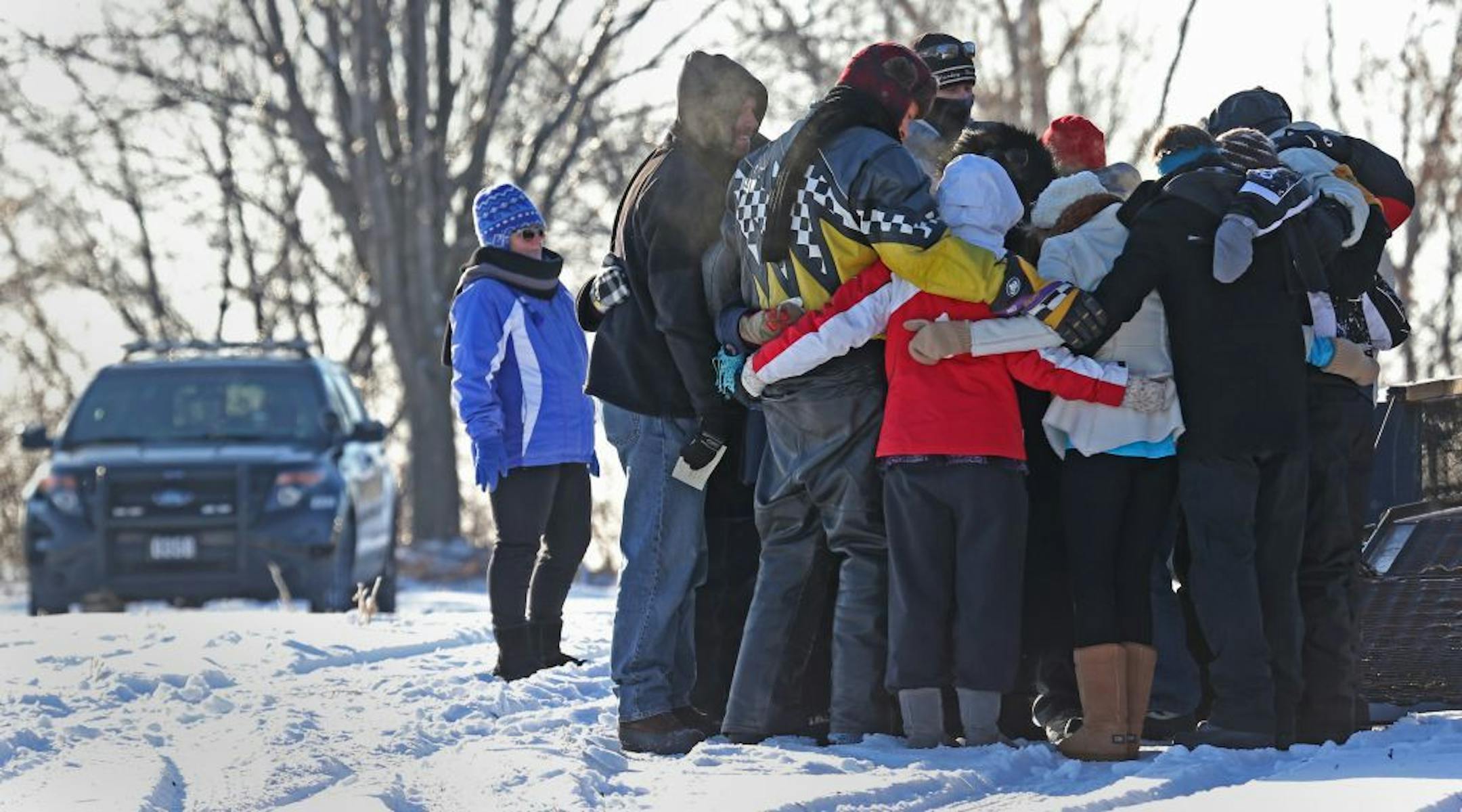 Friends and family members of Alyssa Ettl gathered near 190th St. and Dodd Blvd for a memorial for Ettl after Lakeville Police Department shut down Dodd Boulevard, on 12/7/13, to offer an opportunity for family, friends and students to visit the accident site of Alyssa Ettl. Students were transported to the accident site from the Lakeville North High School in buses. After a brief time of prayer and placement of memorials by the family of Alyssa, students had the opportunity to visit the site an