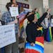 Students and community members chant at a Becker school board meeting March 14 to protest a presentation by a group considered by many to be anti-LGBT