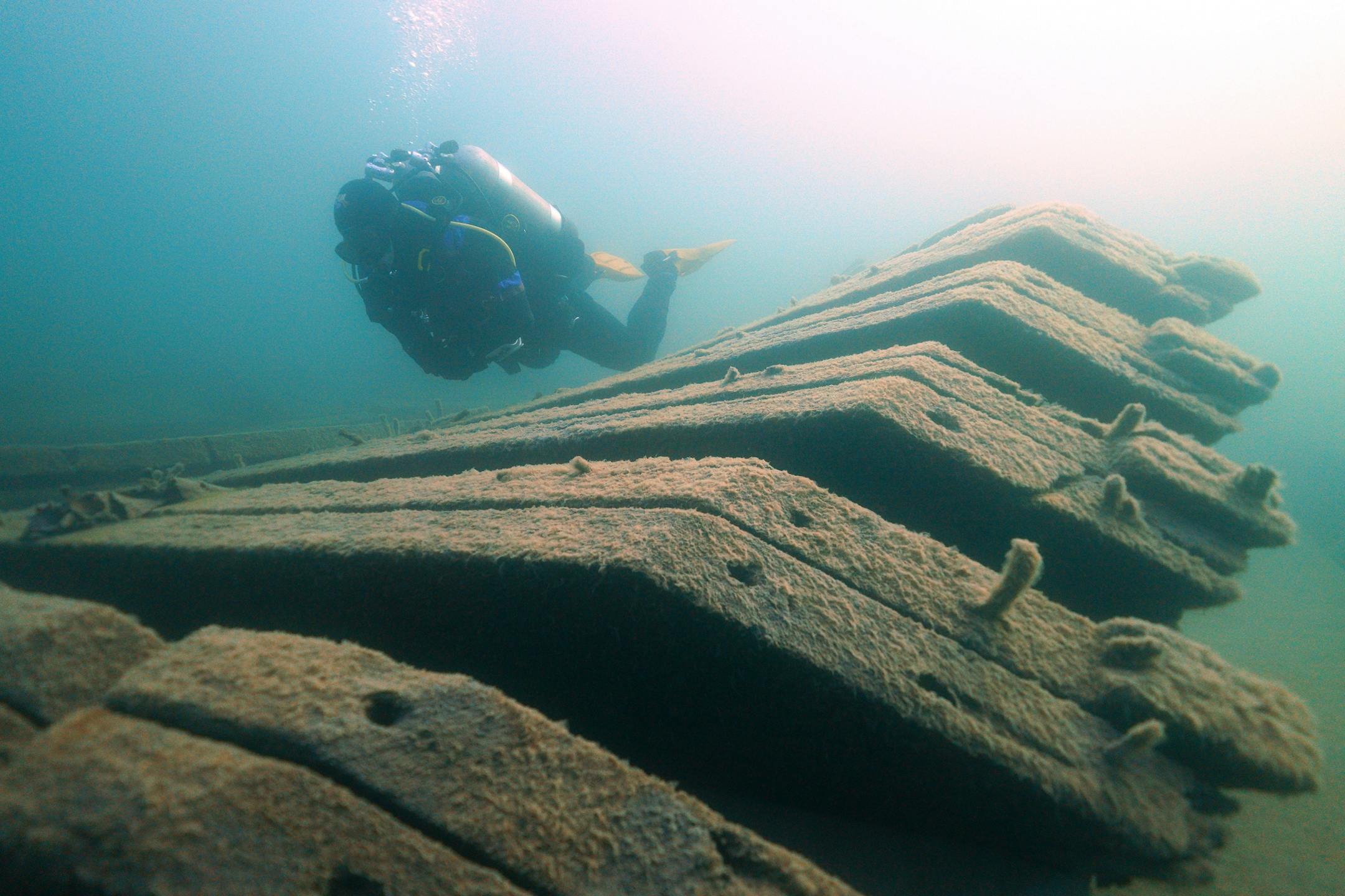 Jack Decker, a diver with the Great Lakes Shipwreck Preservation Society from Clear Lake, Iowa, swam among the remains of the Hesper.