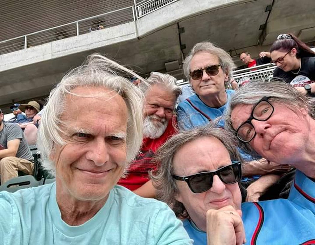 David Aquilina, front center, and his friends call their group the Gentlemen of Leisure. They meet for midweek Twins games at Target Field and enjoy live music, too.