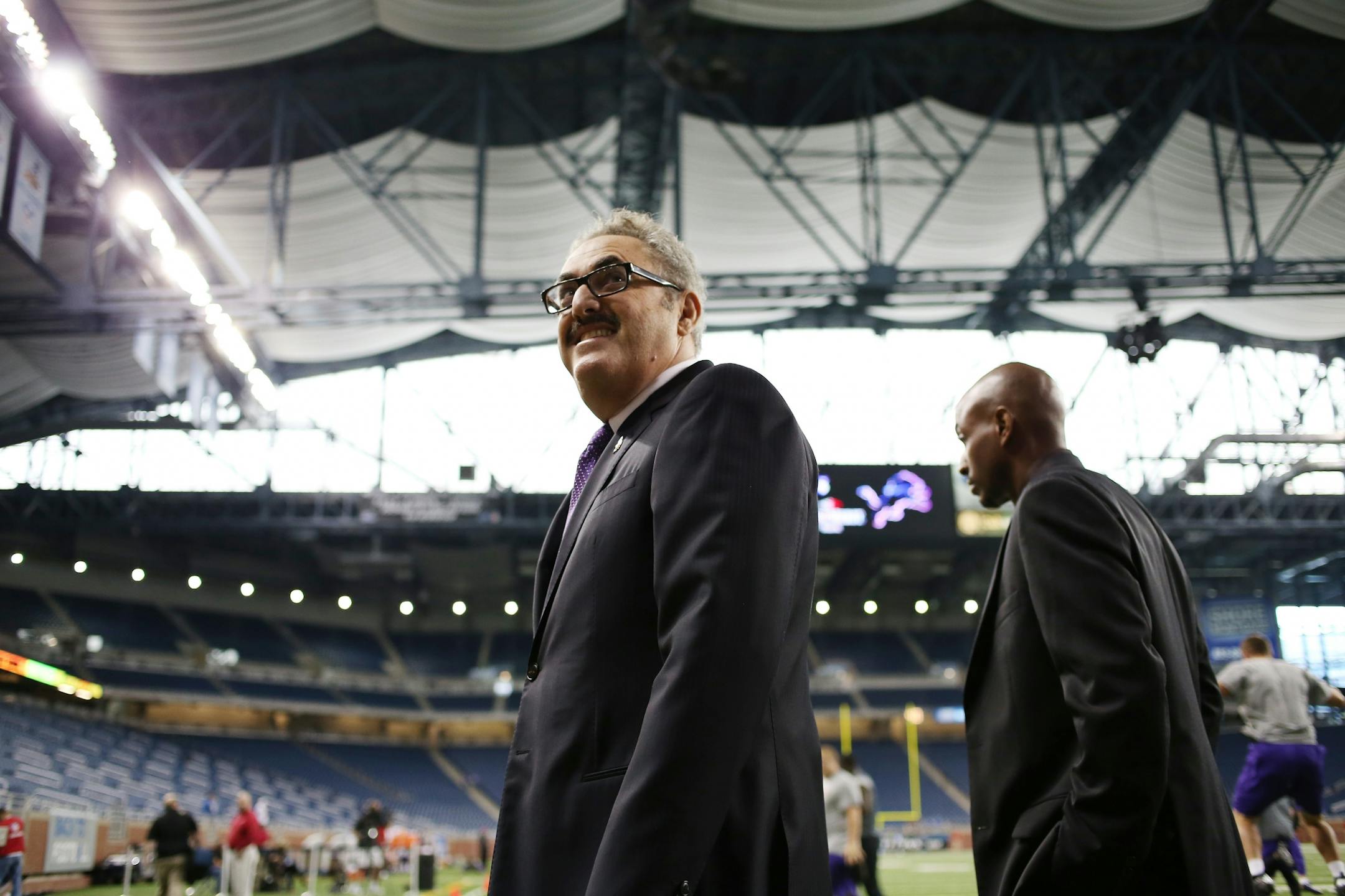 Vikings owner Zygi Wilf walked on the field during Sunday's game at Ford Field between the Vikings and Detroit Lions.