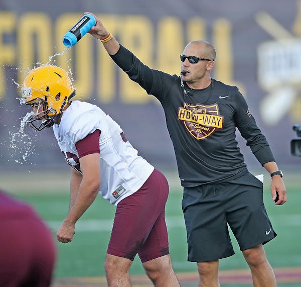 Gophers coach P.J. Fleck poured water on kicker Emmit Carpenter to try to distract him in a recent practice.