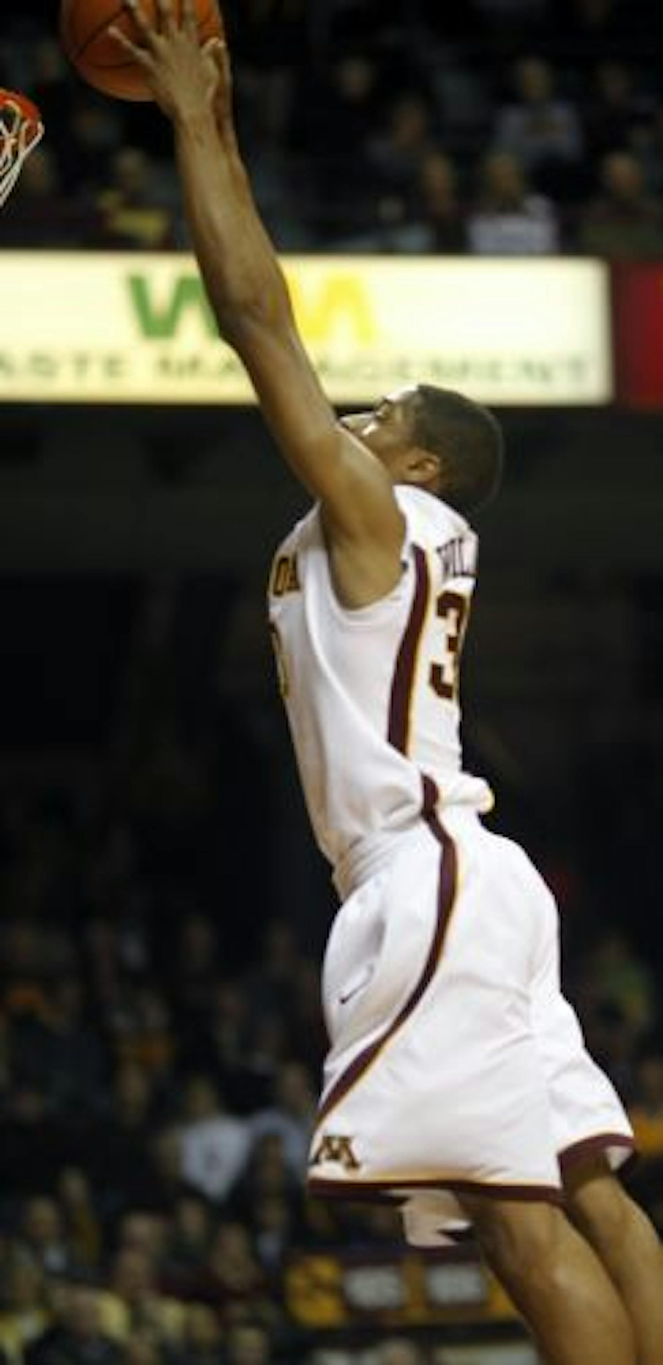 At Williams Arena in a game between the Gophers and the Hoosiers, Rodney Williams makes a spectacular breakaway dunk in the second half.