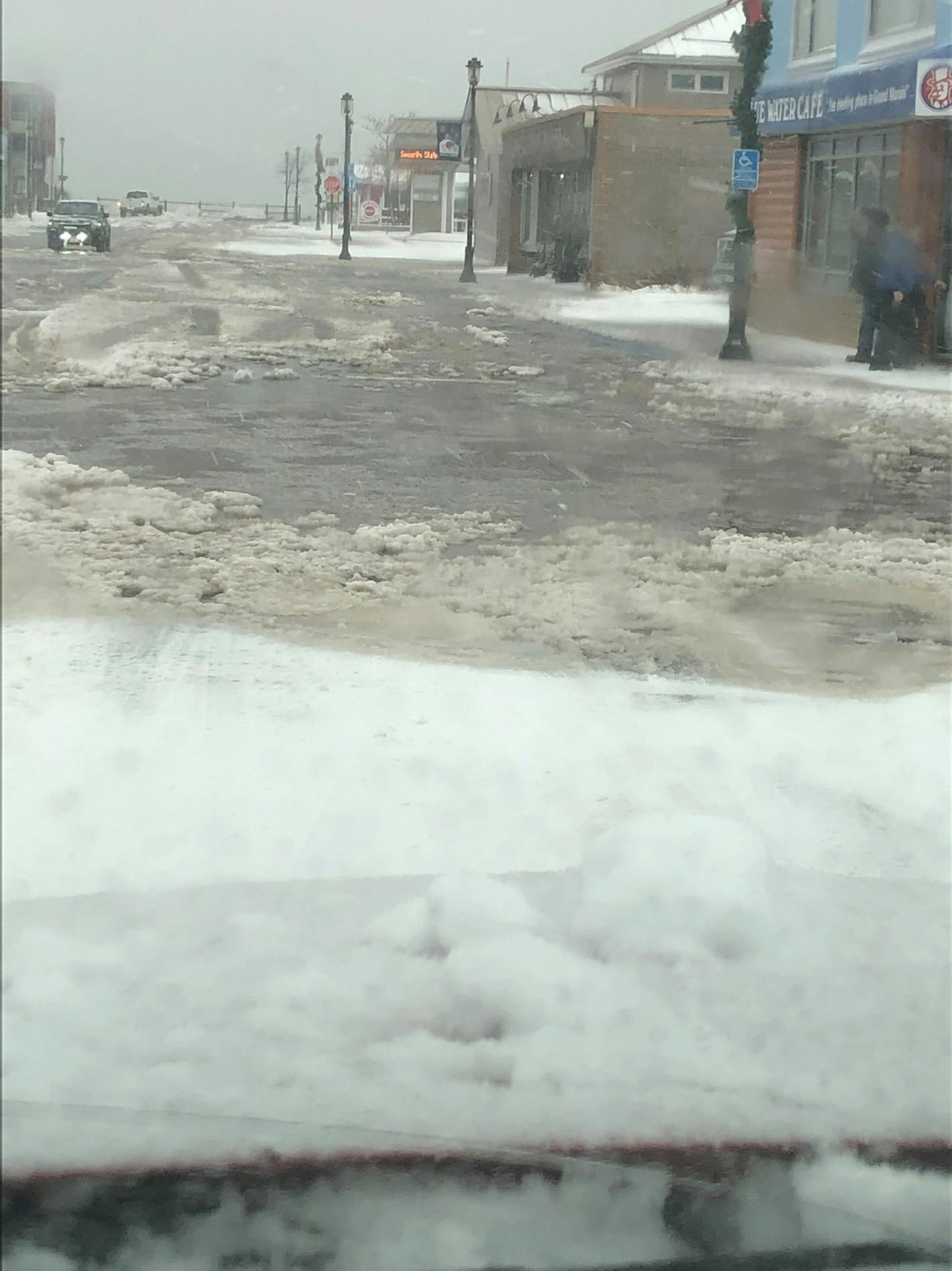 High water and rolling waves sent Lake Superior spilling across downtown Grand Marais during a winter storm Dec. 29.