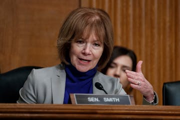 Sen. Tina Smith's campaign unearthed old TV footage of Lewis questioning government crop subsidies and declaring, "Government shouldn't have anything 