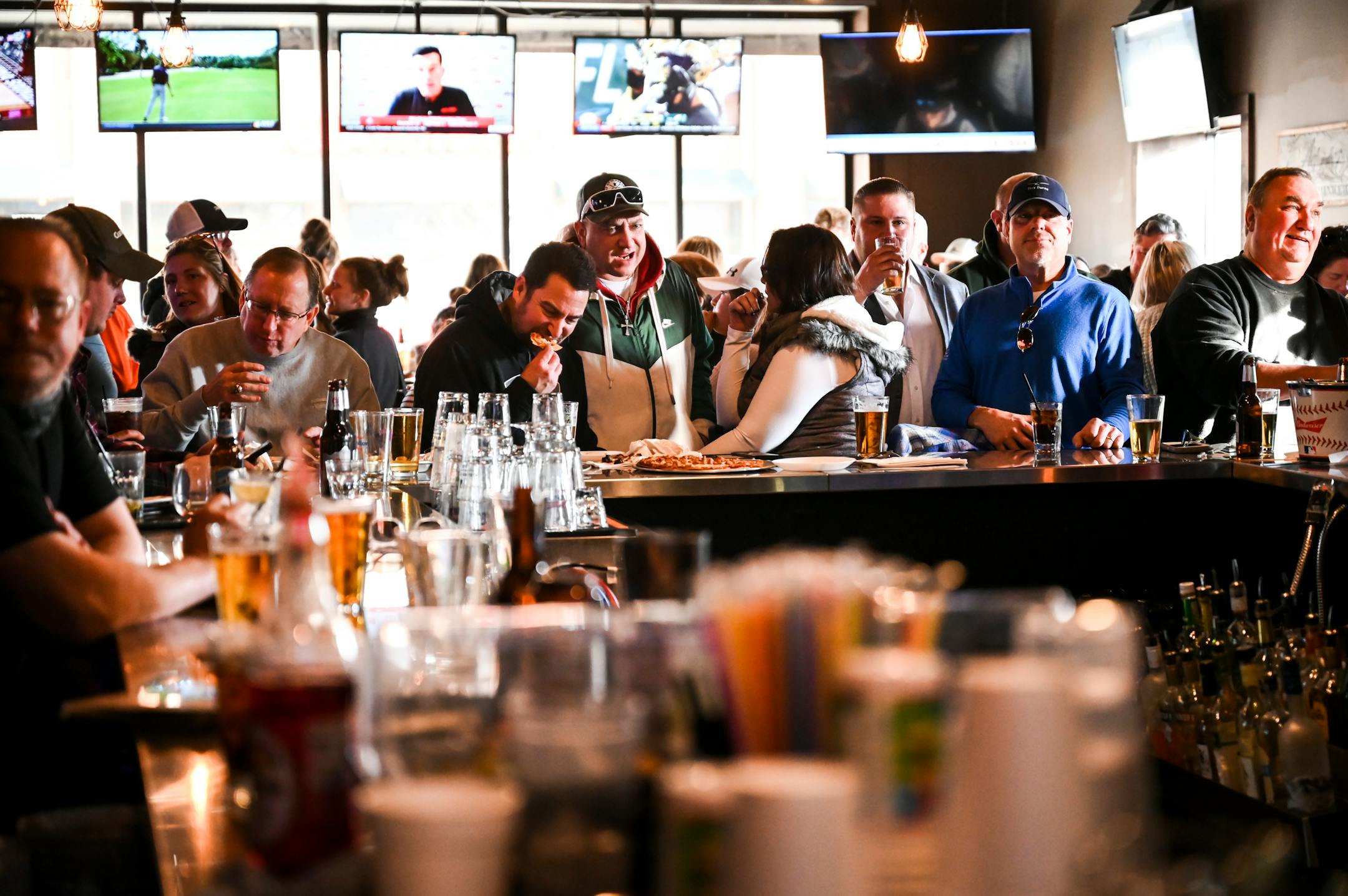 Standing-room only at the bar at Alibi Drinkery in Lakeville, which reopened Wednesday morning in defiance of Gov. Walz's order.