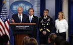 Director of National Intelligence Dan Coats speaks during the daily press briefing at the White House, Thursday, Aug. 2, 2018, in Washington, as FBI D