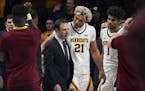 Minnesota Gophers forward Jarvis Omersa (21) talked with head coach Richard Pitino at the end of the game. ] RENEE JONES SCHNEIDER ¥ renee.jones@star
