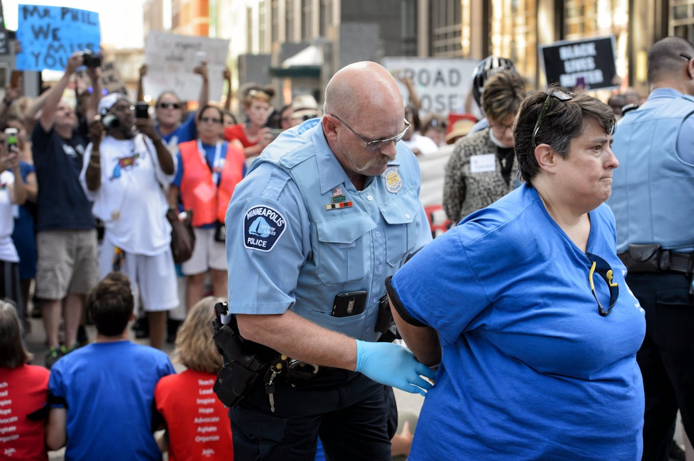 The protesters stopped in front of US Bancorp Center to protest the bank's policies. Twenty one were arrested including the president of Minneapolis Federation of Teachers Michelle Wiese.