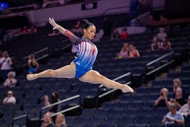 Suni Lee of St. Paul warms up before Day 1 of the U.S. women's gymnastics Olympic trials at Target Center on Friday.