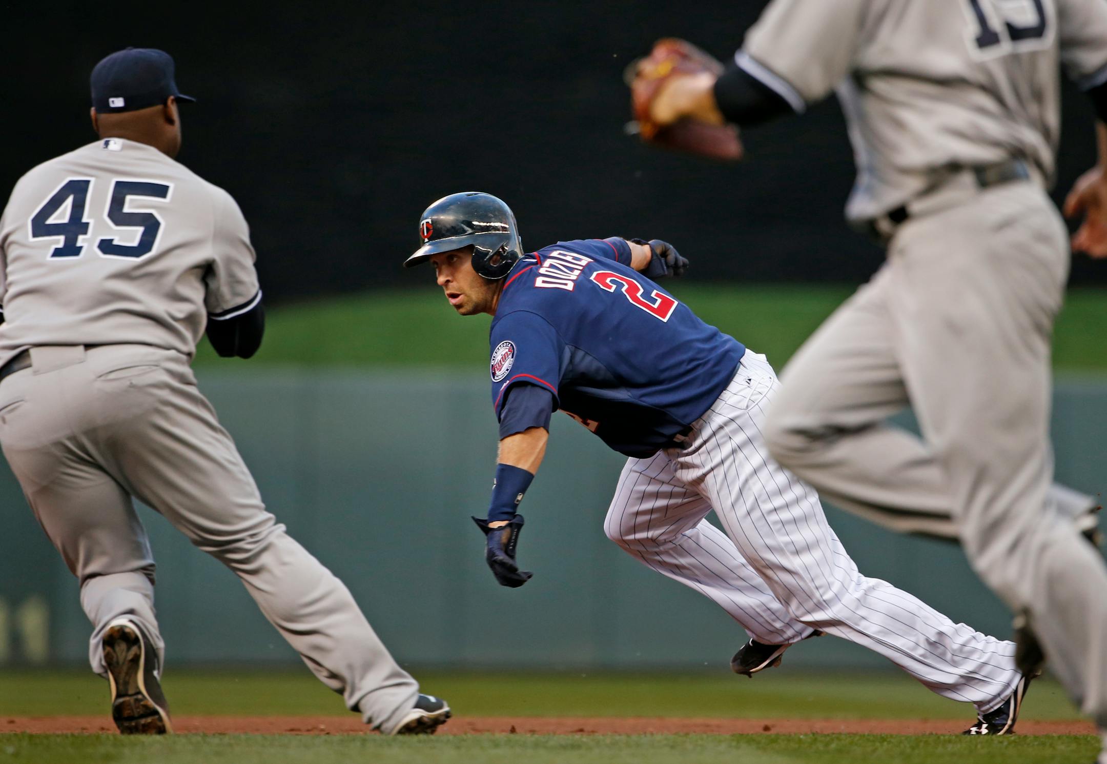 Brian Dozier was run down by New York's Zelous Wheeler (45) in the third inning.