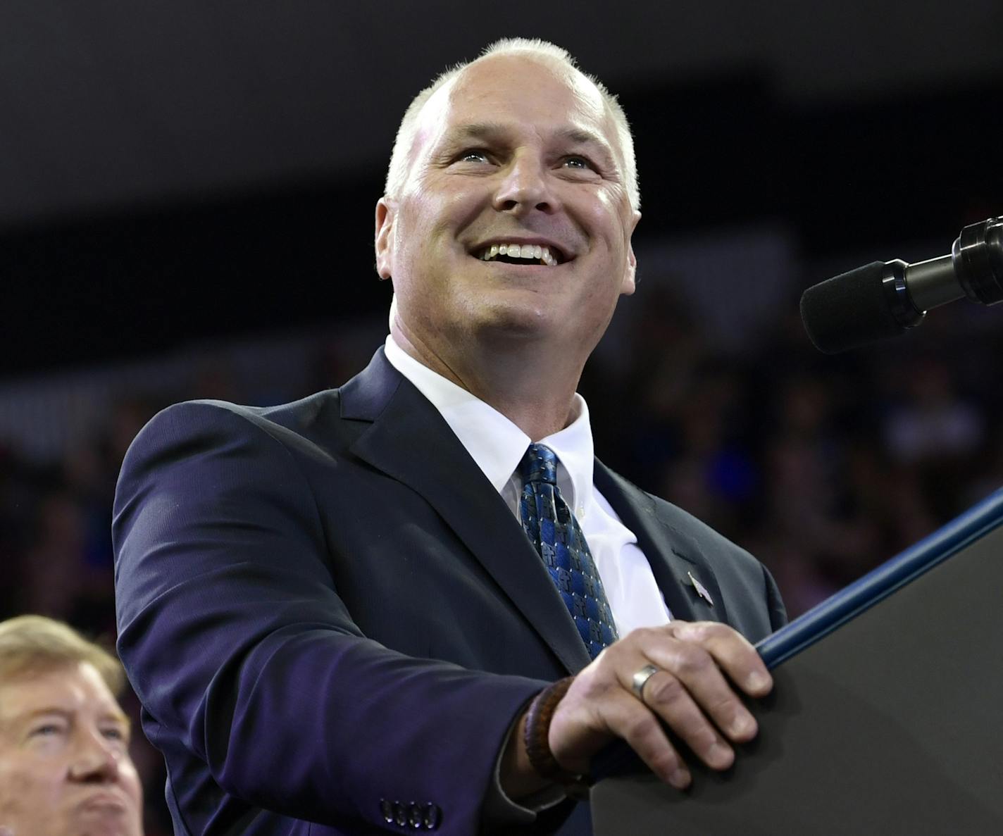 FILE - In this June 20, 2018 file photo, Pete Stauber, a Republican congressional candidate running in a traditionally Democratic district, speaks during a rally at AMSOIL Arena in Duluth, Minn. Stauber won the GOP primary Tuesday, Aug. 14, for the northeastern Minnesota congressional seat being vacated by Democrat Rick Nolan (AP Photo/Susan Walsh, File)