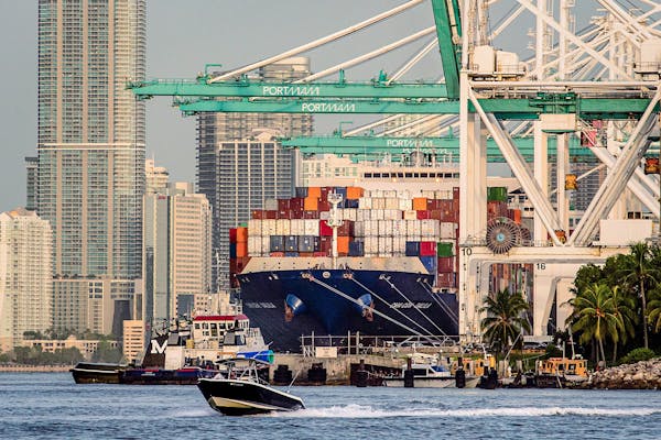 Container ships are no longer backed up at U.S. ports as they were when this photo was taken a year ago in Miami. But other logistics constraints weig