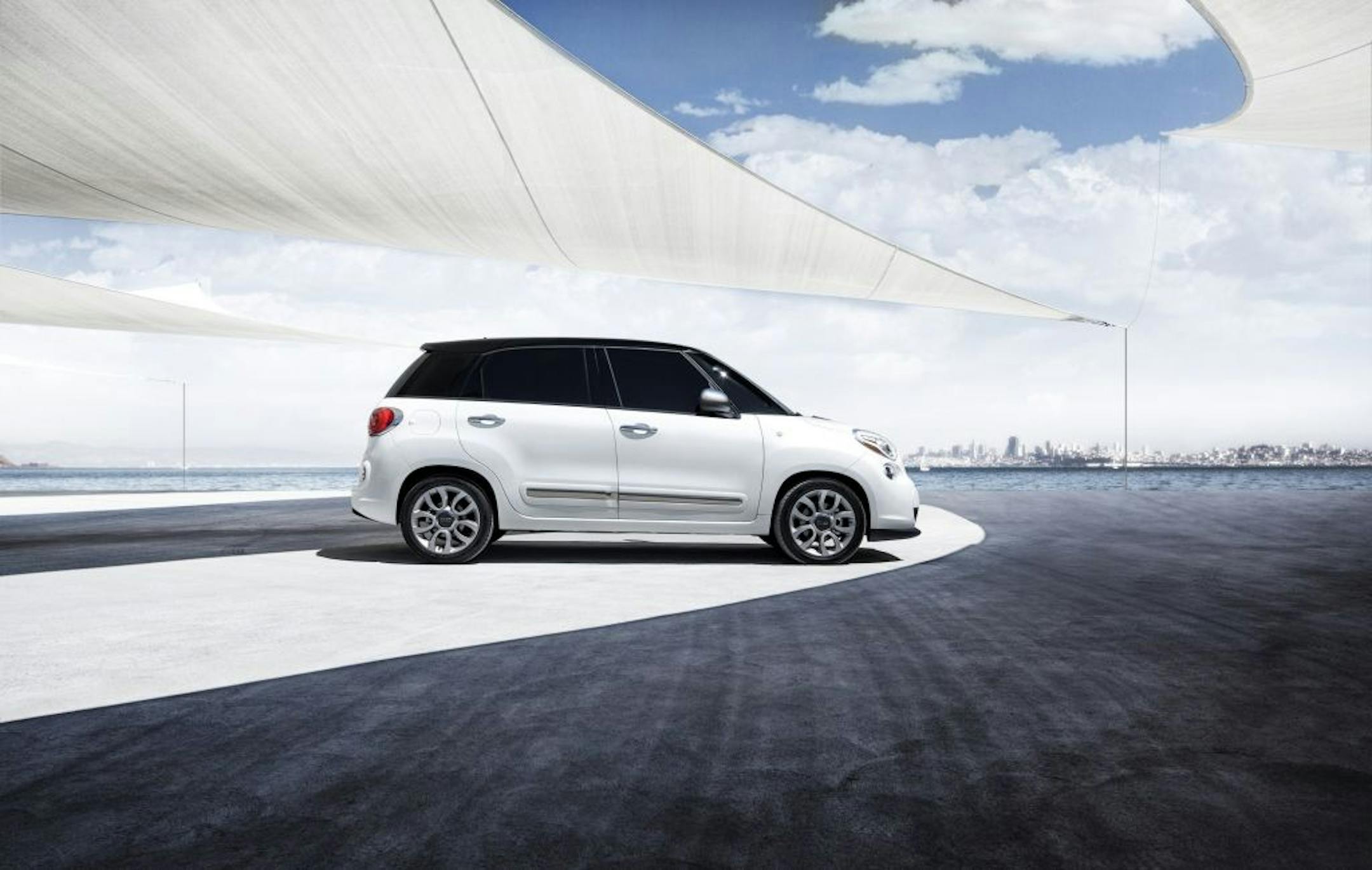 The 2014 Fiat 500L is a five-door vehicle that's 27 inches longer, 6 inches taller and 6 inches wider than the 500, Fiat's first vehicle in its return to the U.S.