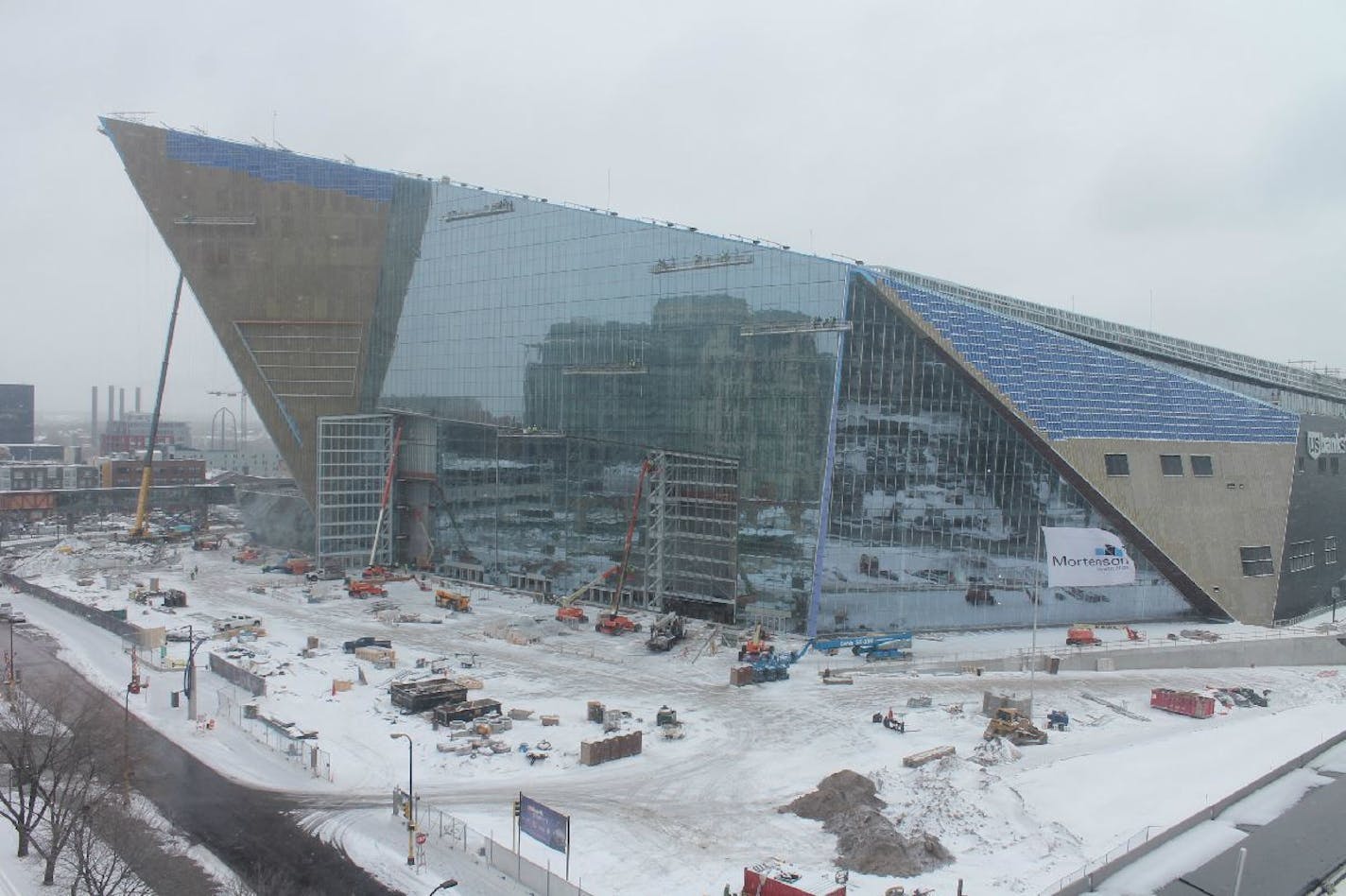 A webcam image shows one of the new signature doors being installed for the Vikings' new stadium.