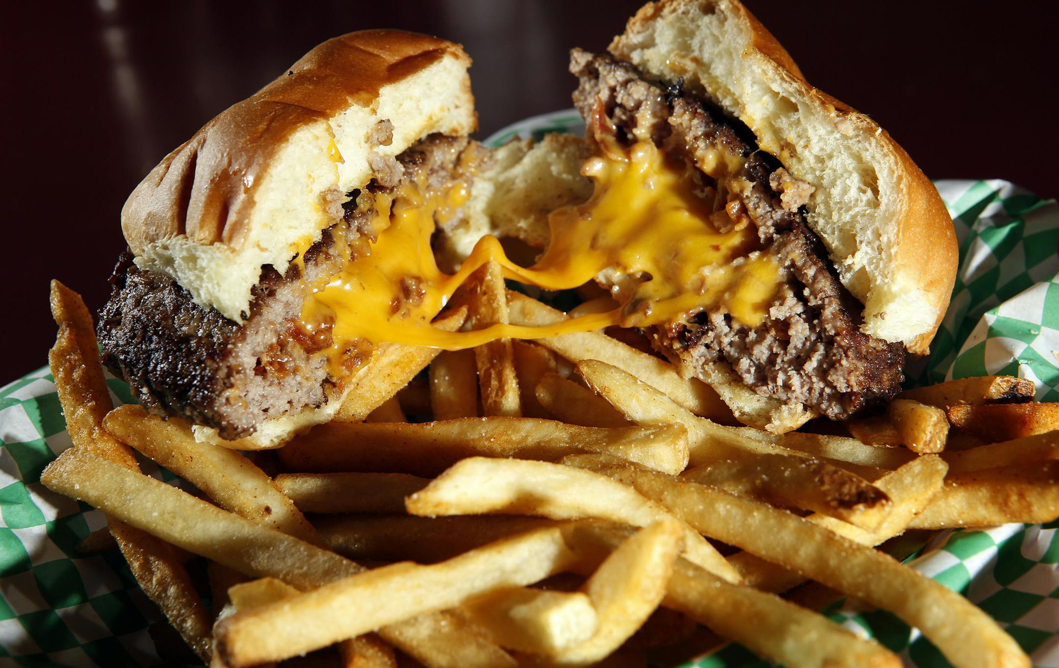 CARLOS GONZALEZ • cgonzalez@startribune.com June 23, 2010 – Taste of Minnesota Foods – Vita.mn - Barrio – Tacos - -- 5-8 Club - "Pig Pen" Juicy Lucy - -- Retch's Cookie Dough and Cream Cheese Comets - cream cheese comets and the deep-fried cookie dough ] 5-8 Club - "Pig Pen" Juicy Lucy – Bacon-infused cheddar cheese and bacon crumbles between 2 fresh never frozen patties of USDA choice ground beef, served on a bakery fresh bun.