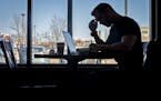 Former firefighter Brian Cristofono spent time doing homework at a coffee shop, Thursday, March 29, 2018 in Plymouth, MN. After leaving the fire depar