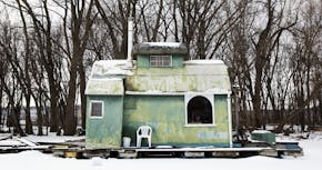 ADVANCE FOR SATURDAY FEB 25 AND THEREAFTER - In a Tuesday, Jan. 31, 2017 photo, one of more than 100 houseboats lining the shore of Latch Island sits 